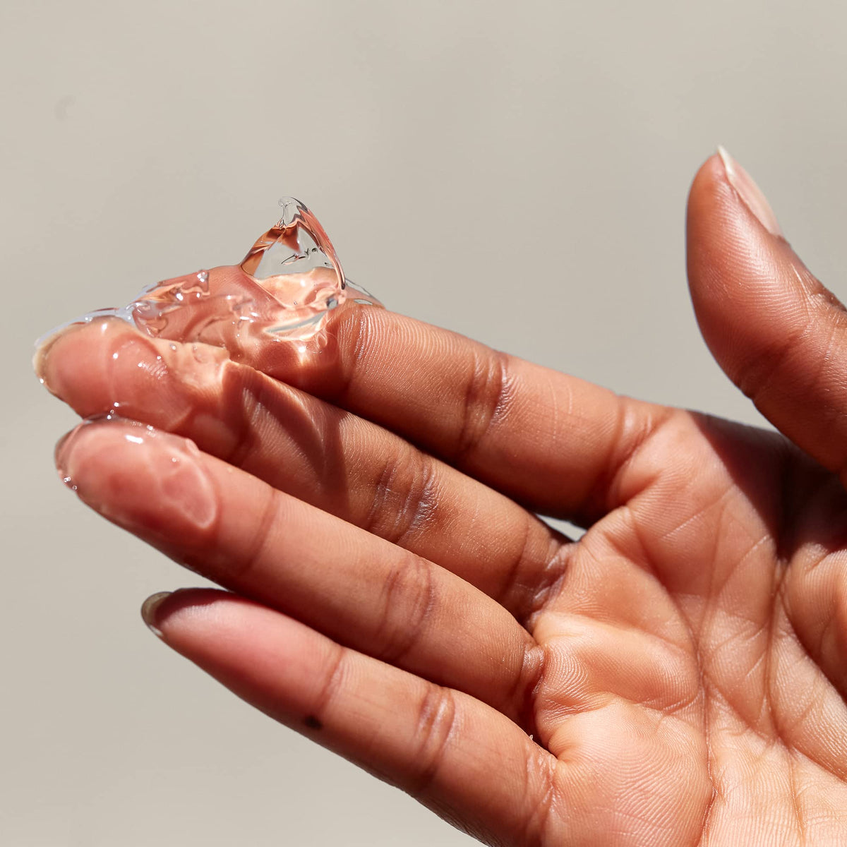 PATTERN gel on hands demonstrating smooth application and controlled styling benefit