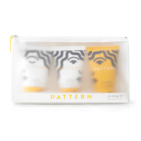 PATTERN travel kit front view showing three minis and clear bag for easy packing