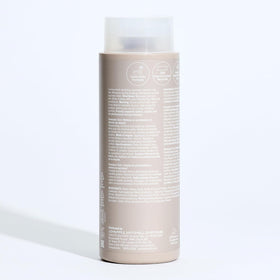 Paul Mitchell cap dispense detail showing easy control and reduced waste benefit
