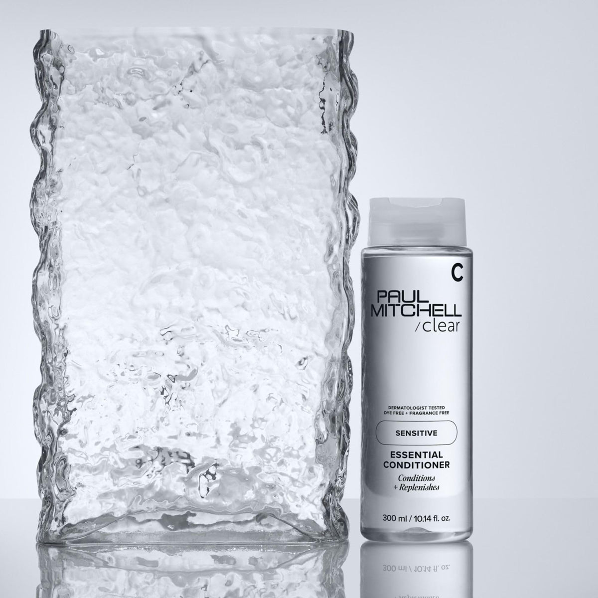 Paul Mitchell packaging PCR label showing recycled-materials environmental benefit
