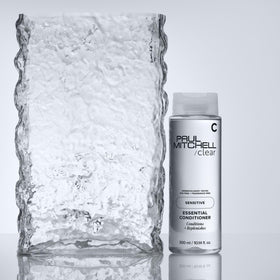 Paul Mitchell packaging PCR label showing recycled-materials environmental benefit