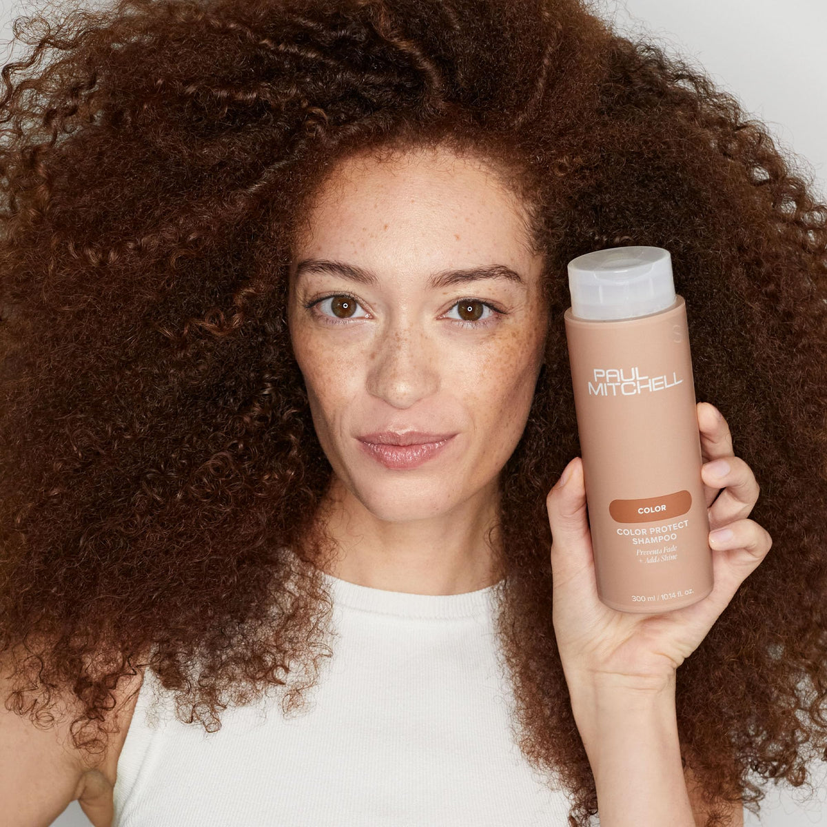 Paul Mitchell hair after use showing enhanced shine and smoothness