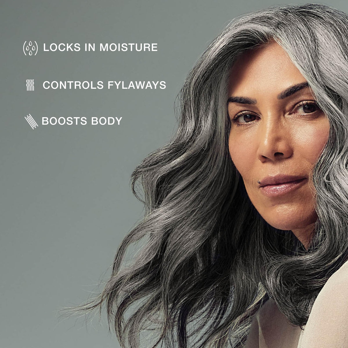 Paul Mitchell foam staged with round brush and dryer, shows salon-style blowout prep