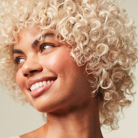 Paul Mitchell lather texture showing gentle foam for hydrating cleanse