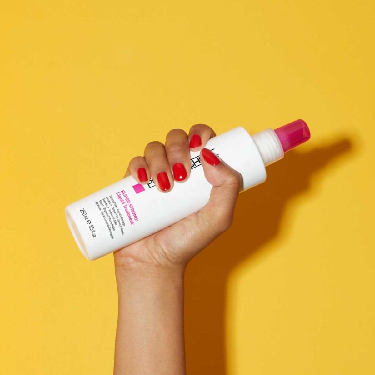 Paul Mitchell spray pump detail highlighting easy application and precise misting benefit
