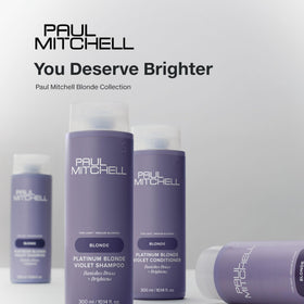 Model in salon using Paul Mitchell shampoo on blonde hair for cool-toned maintenance