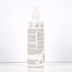 Paul Mitchell on bathroom shelf conveying everyday styling convenience