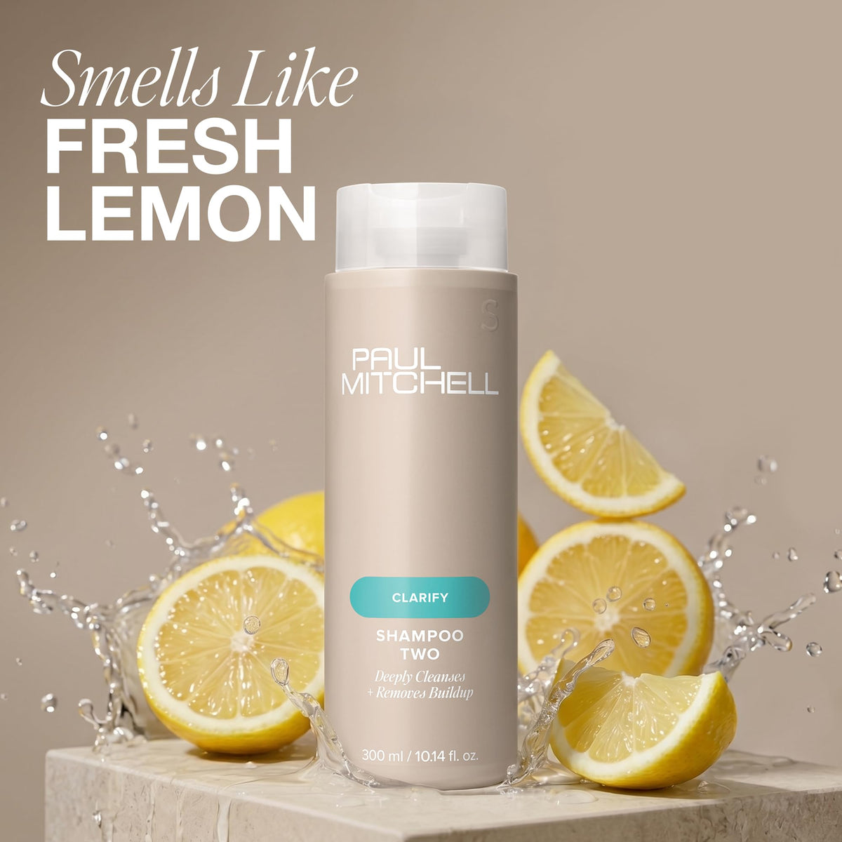 Paul Mitchell shampoo applied to scalp demonstrating oil removal benefit