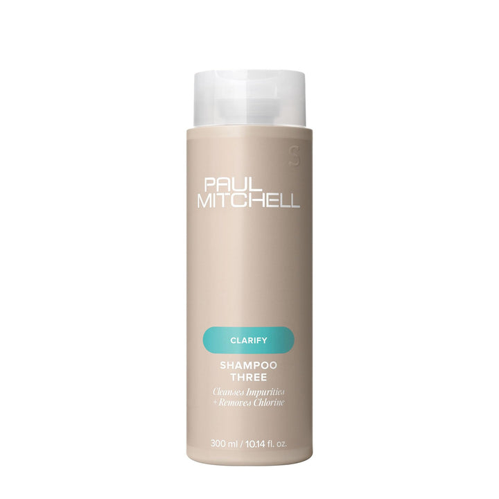 Paul Mitchell Shampoo Three front bottle shows clarifying formula benefit