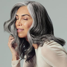 Paul Mitchell shampoo lather on hair demonstrating clarifying action benefit