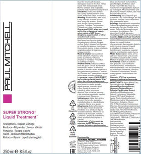 Paul Mitchell bottle beside hand for scale showing convenient 8.5 fl oz travel-friendly size