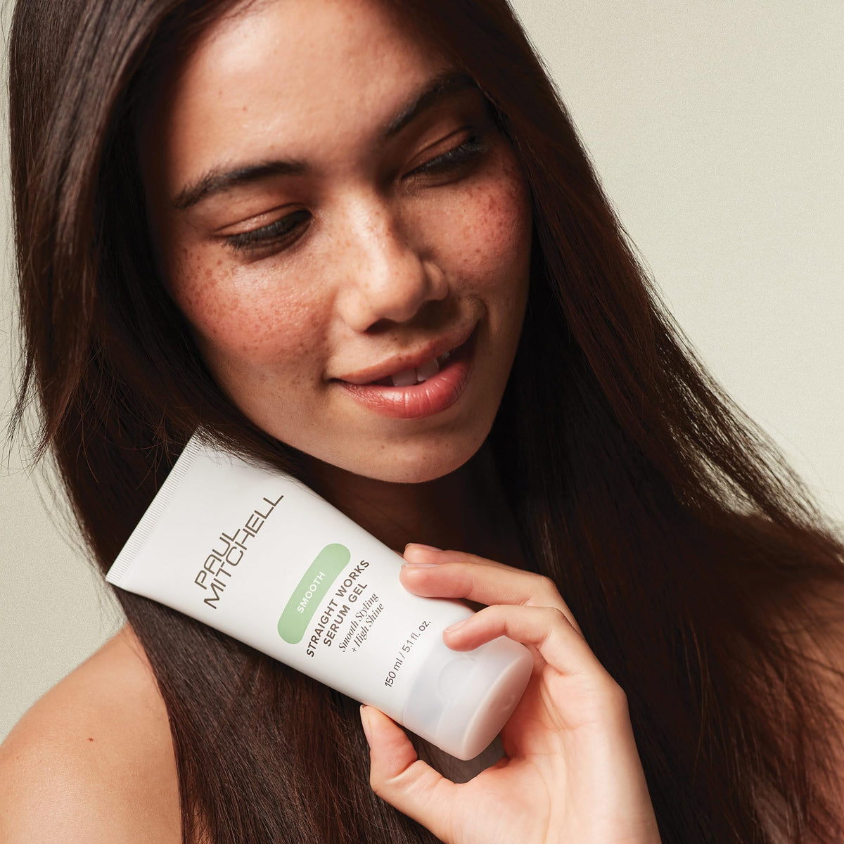 Paul Mitchell before and after hair comparison showing reduced frizz benefit