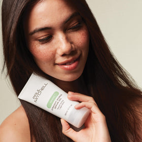 Paul Mitchell before and after hair comparison showing reduced frizz benefit