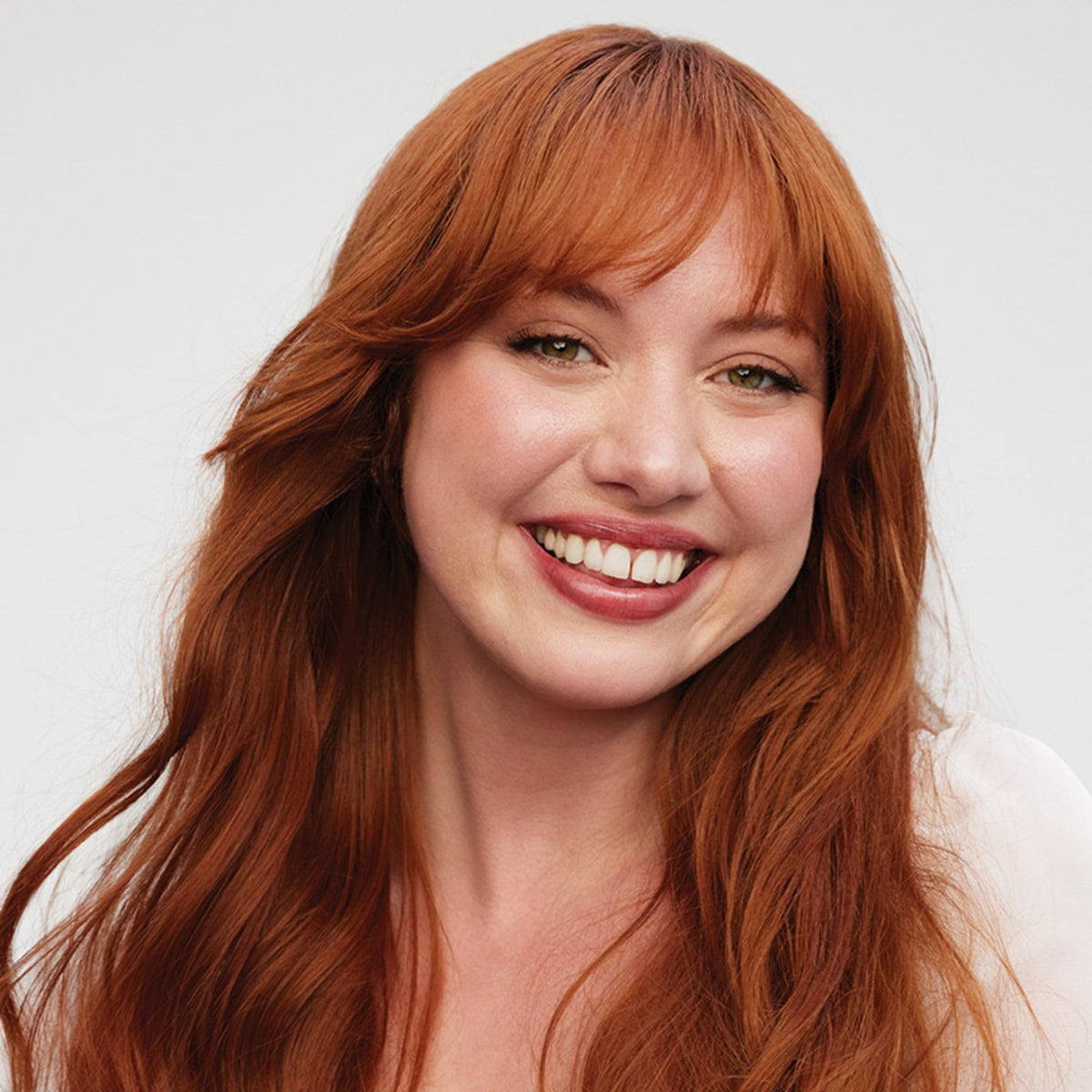 Paul Mitchell cream applied to damp hair for smoother blow-dry results