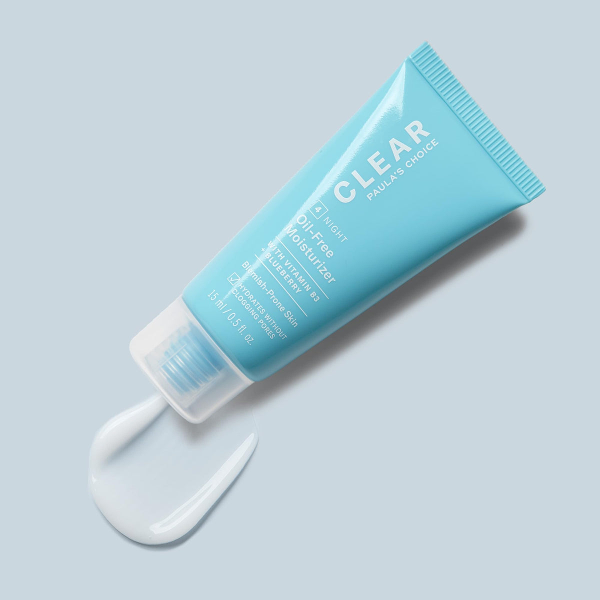 Paula's Choice CLEAR applied on hand demonstrating quick absorption and matte finish