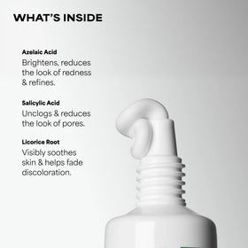 Paula's Choice applying booster to cheek spot to reduce discoloration