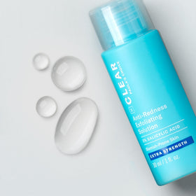 Paula's Choice 1oz bottle next to coin showing compact travel-friendly benefit