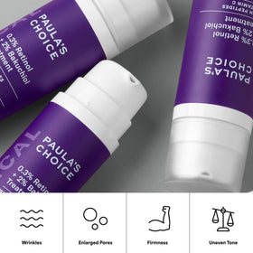 Paula's Choice bottle in hand to show 1 oz scale and travel-friendly size