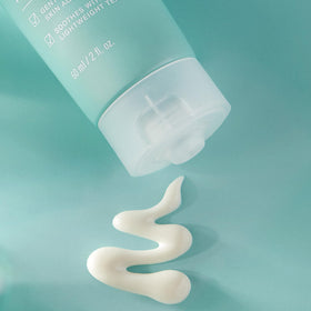 Paula's Choice 2 oz tube shown next to a coin for size comparison benefit