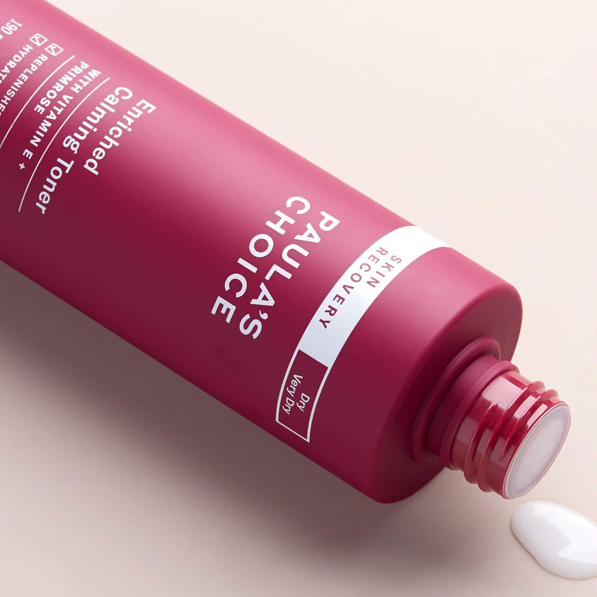 Paula's Choice bottle beside measuring tape for 6.4 oz scale, clarifies size