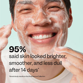 Peach Slices cleanser in hand demonstrating lightweight lather