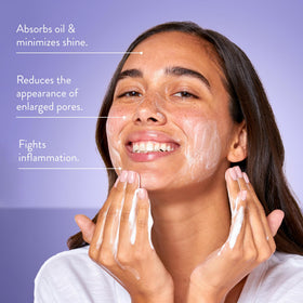 Peach Slices pump dispensing cleanser on hand for effective oil control