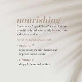 Close-up of Pearlessence label highlighting argan and vitamin E benefits