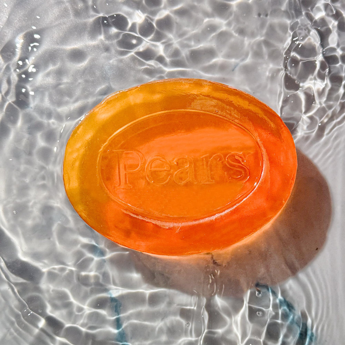 Pears soap placed on a bathroom counter suggesting daily use and subtle scent