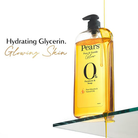 Natural essential oils next to Pears bottle conveying soft fragrance benefit