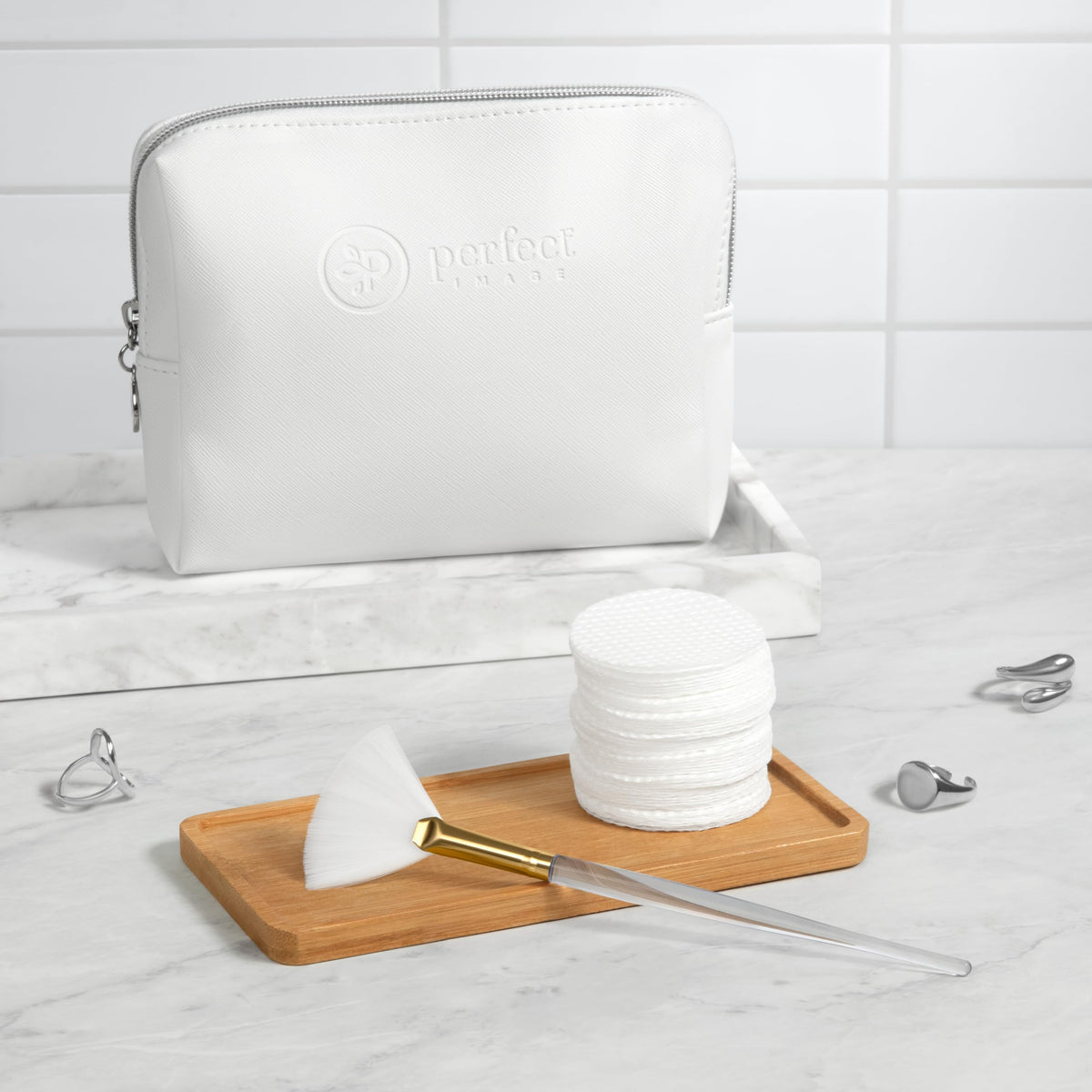 Perfect Image pad beside coin demonstrating compact size for easy storage