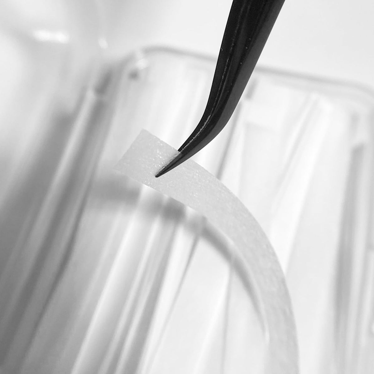 PERMANIA strip beside a ruler showing size for precise application