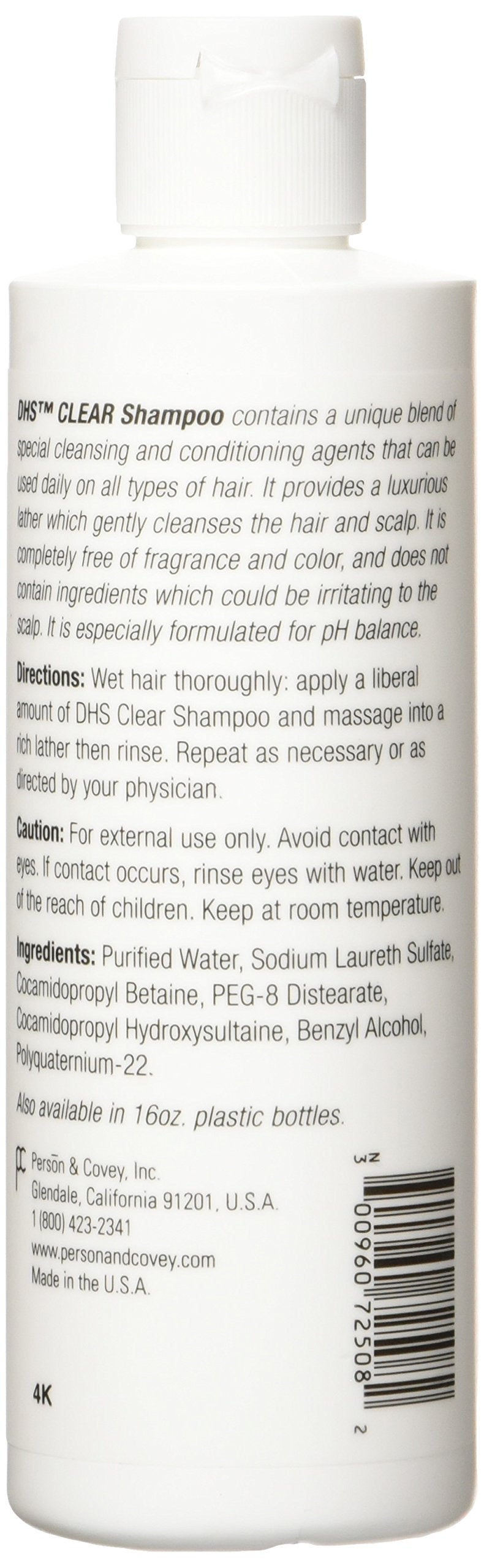 Person & Covey DHS clear shampoo held in hand to show size and travel convenience