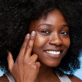 Peter Thomas Roth size comparison with hand to show travel-friendly benefit