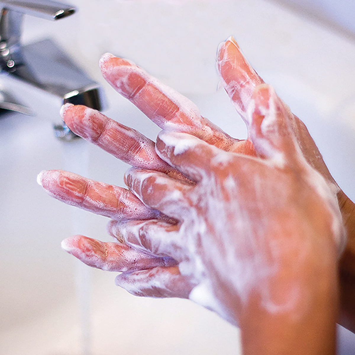 P&G PROFESSIONAL Safeguard size comparison with hand illustrating one-gallon scale