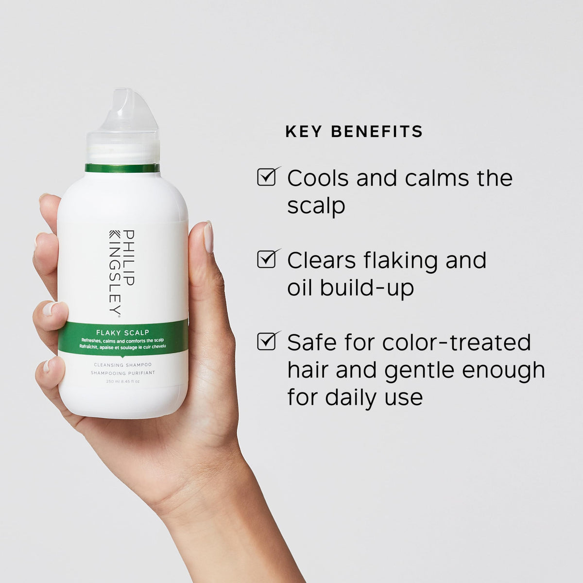 PHILIP KINGSLEY shampoo texture on hand to show lathering and gentle cleansing action