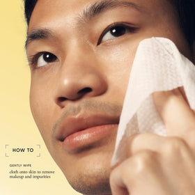 philosophy wipe in hand removing makeup demonstrating quick on-the-go use