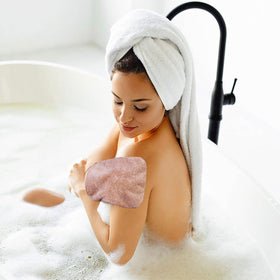 PHOGARY mitt on bathroom counter beside soap showing ready-to-use everyday convenience
