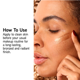 Physicians Formula bronze booster applied on cheek demonstrating instant warm radiance