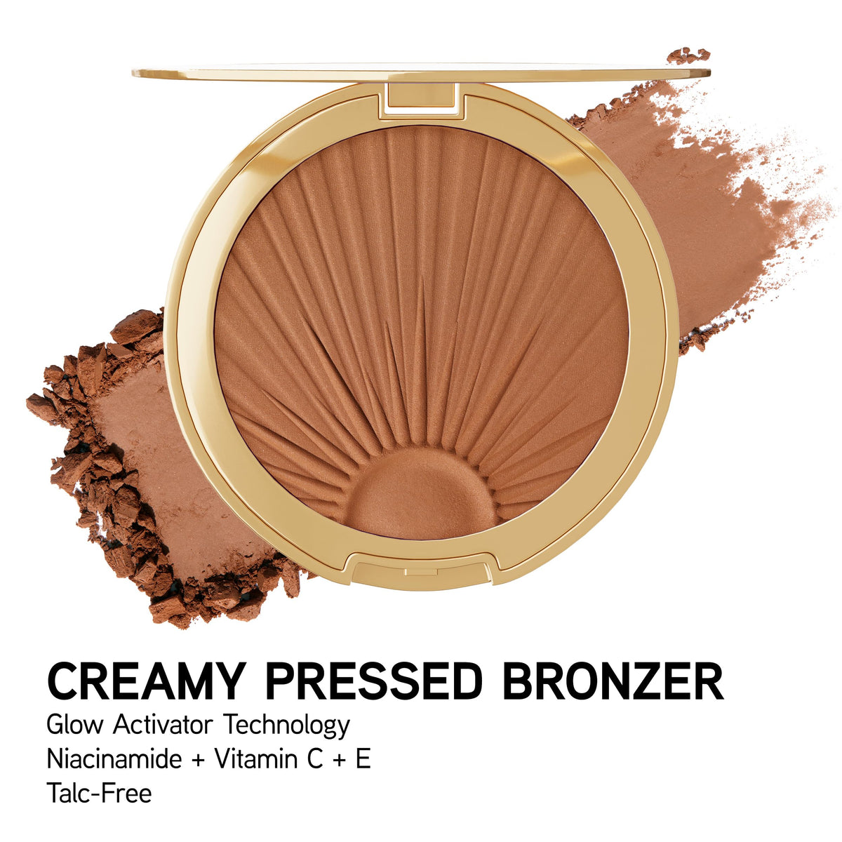 Physicians Formula bronzer on a vanity with summer props showing radiant, warm makeup look
