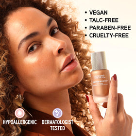 Physicians Formula bronze booster beside foundation illustrating lasting makeup grip