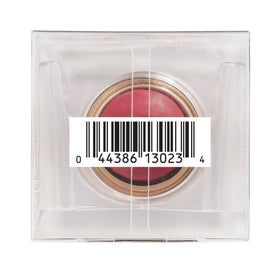 Physicians Formula stick held in hand to show size and portability for on-the-go touchups