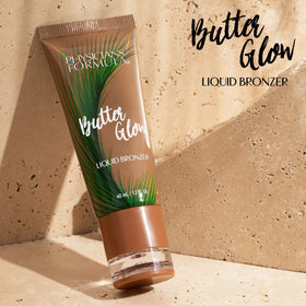 Physicians Formula swatch on hand illustrating buildable warm glow