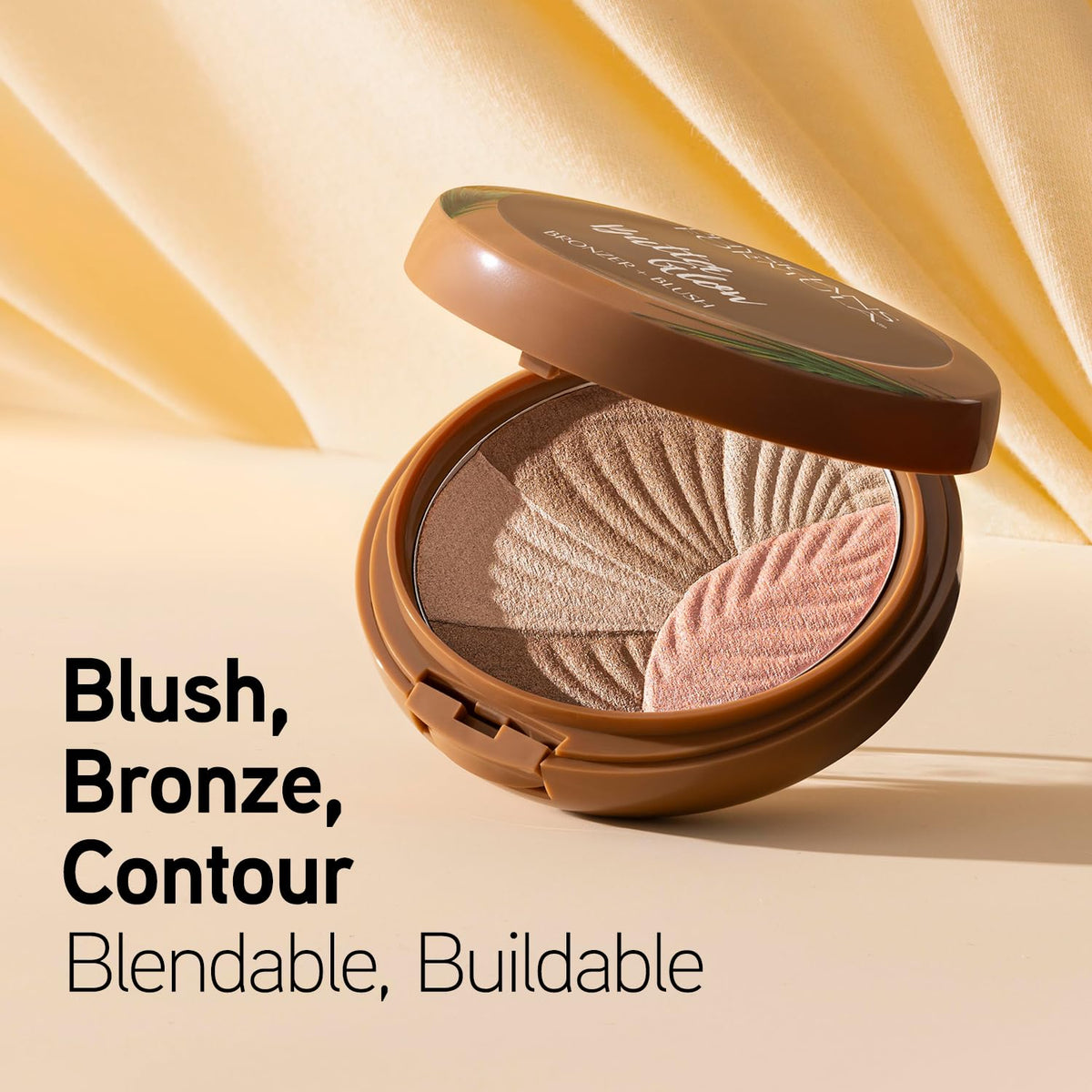 Physicians Formula open pan close-up showing creamy texture and dual shades