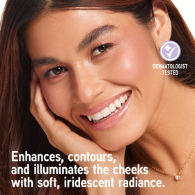 Physicians Formula applying blush with brush demonstrating smooth blendability and buildable color