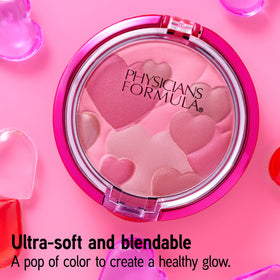 Physicians Formula close-up of powder texture highlighting multi-reflective pearls for radiant finish