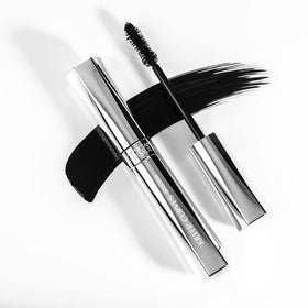 Physicians Formula mascara held in hand to show size and scale