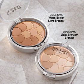 Physicians Formula swatch close-up showing blended texture for natural bronzing