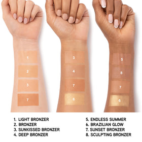 Physicians Formula bronzer being applied with brush for blendable natural warmth