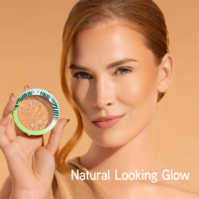 Physicians Formula bronzer close-up swirl detail revealing buttery pigments and luminous sheen