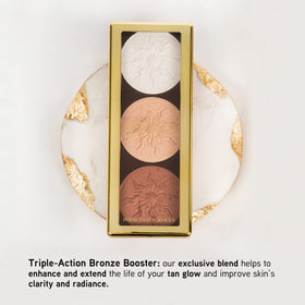 Physicians Formula palette in hand to show compact size and travel-friendly benefit